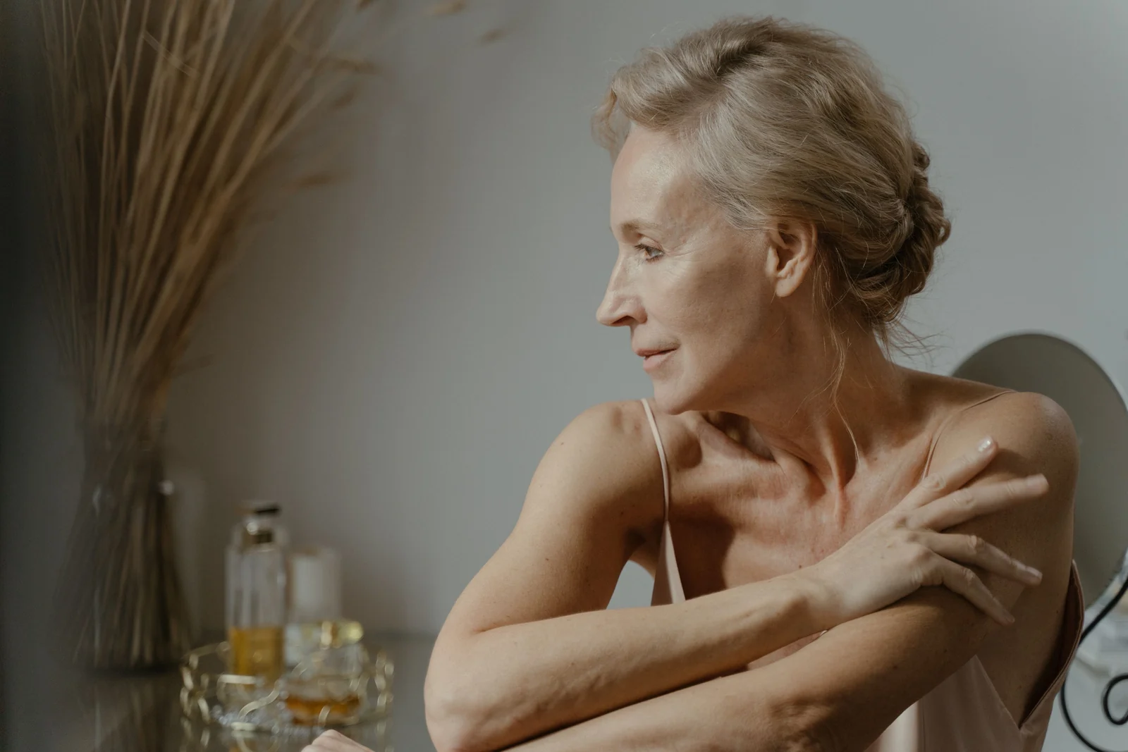 A woman at her dressing table